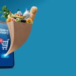 Online,Grocery,App,On,Smartphone,And,Full,Grocery,Bag,Coming