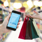 Hand,Holding,Mobile,Smart,Phone,With,Cyber,Mobile,Shop,On