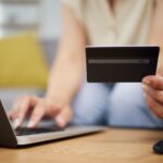 Hands,,Credit,Card,And,Online,Shopping,On,Laptop,In,Home