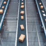 Modern,Delivery,Logistics,Warehouse,With,Working,Automated,Conveyor,Belt,With