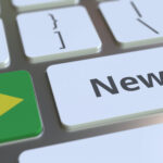 News,Text,And,Flag,Of,Brazil,On,The,Keys,Of