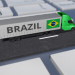 Flag,Of,Brazil,On,Moving,Truck,And,Computer,Keyboard.,International
